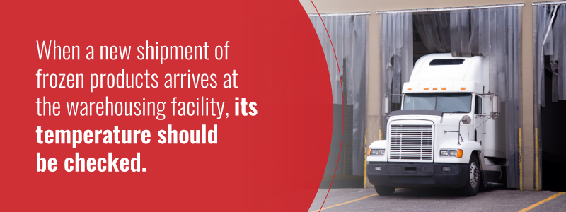 tractor trailer leaving a refrigerated warehouse.