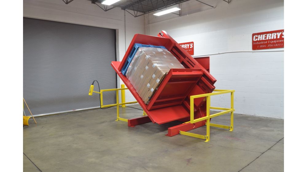 Dual clamp pallet inverter transferring bagged product