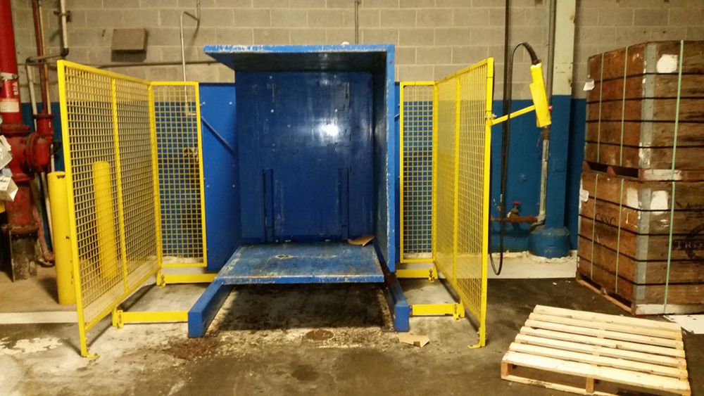 Pallet Inverter in heavy use at a manufacturing facility