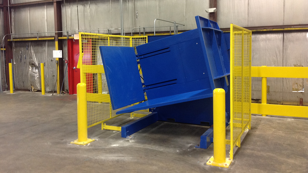 Pallet Inverter with protective guarding and bollards